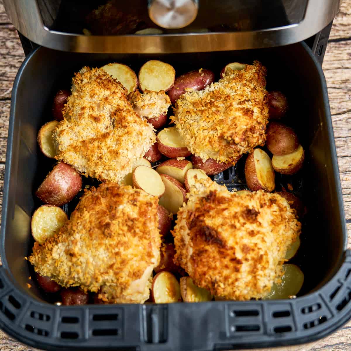 Chicken and potatoes After 20 minutes, browned in spots and ready to flip