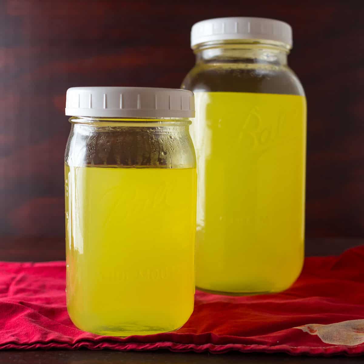 Two large jars of limoncello