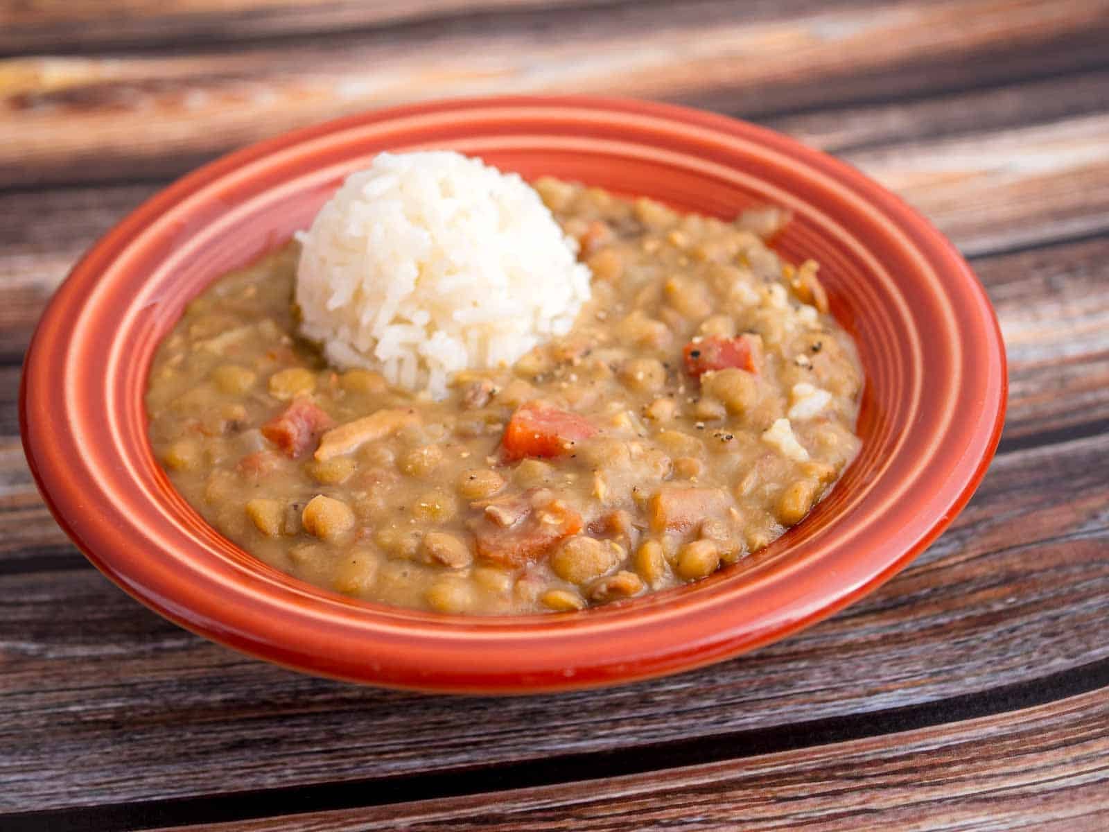 A bowl of Instant Pot Lentils and Bacon (with rice)
