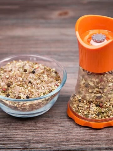 Coriander Fennel and Garlic Seasoning - whole spices in a grinder