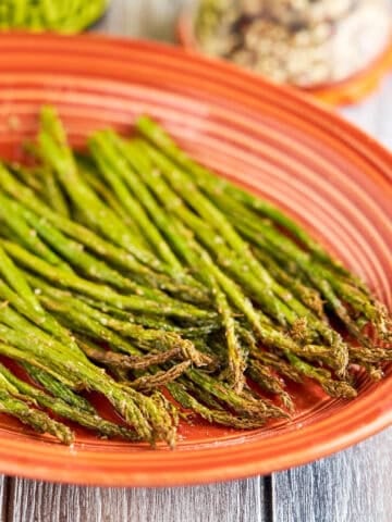 Air Fryer Asparagus cooked and on a platter