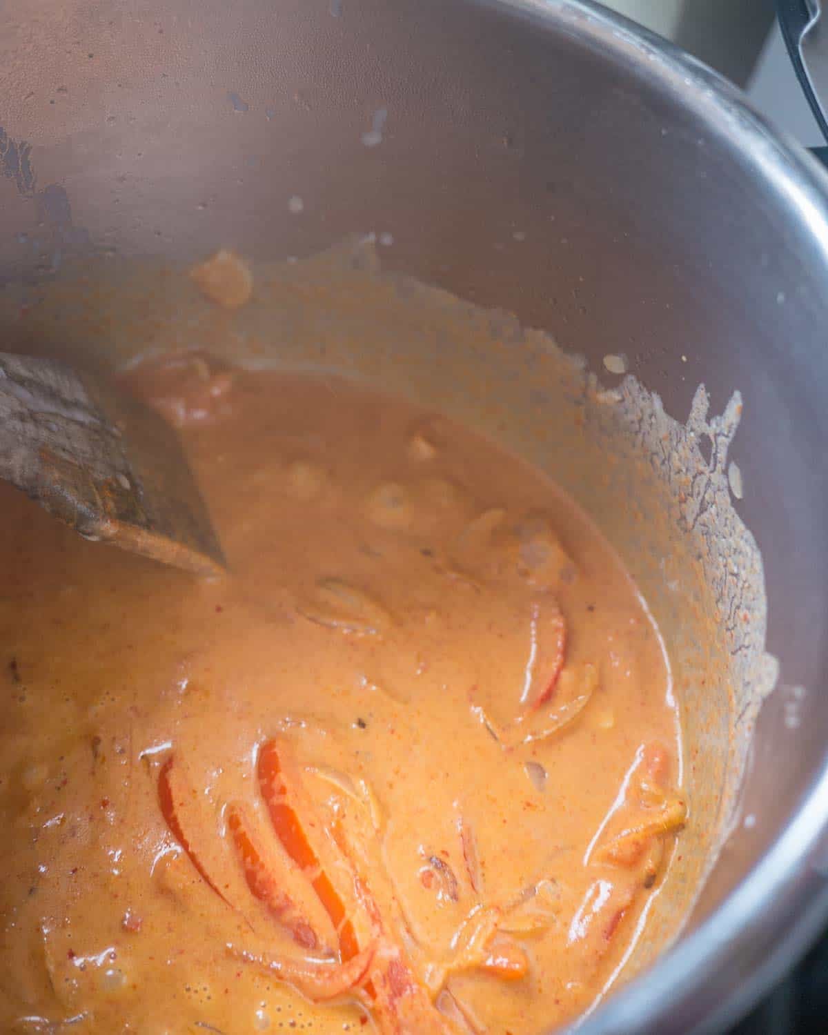 Frying thai red curry paste in coconut cream in an Instant Pot