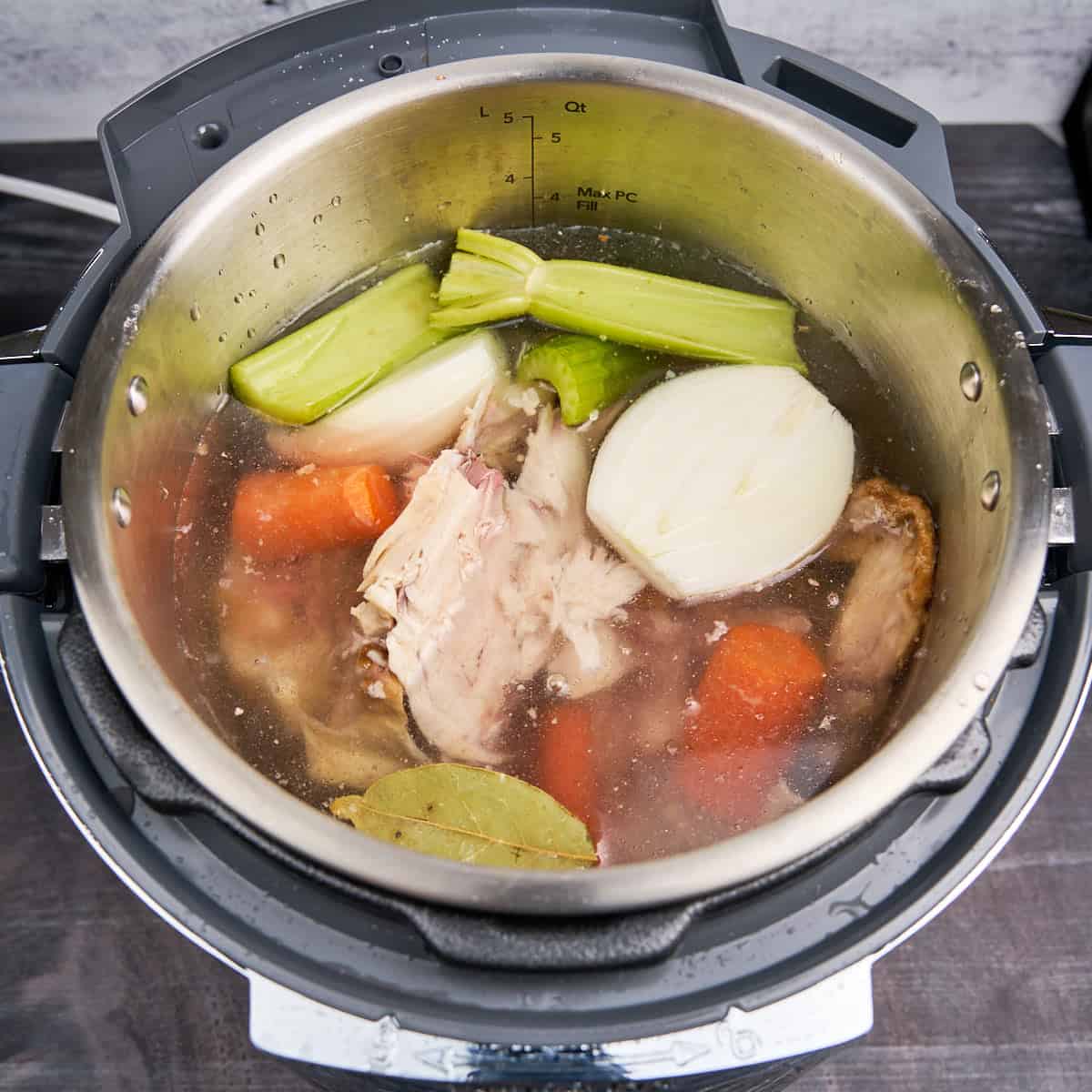 Everything in the pot for Instant Pot Rotisserie Chicken Broth
