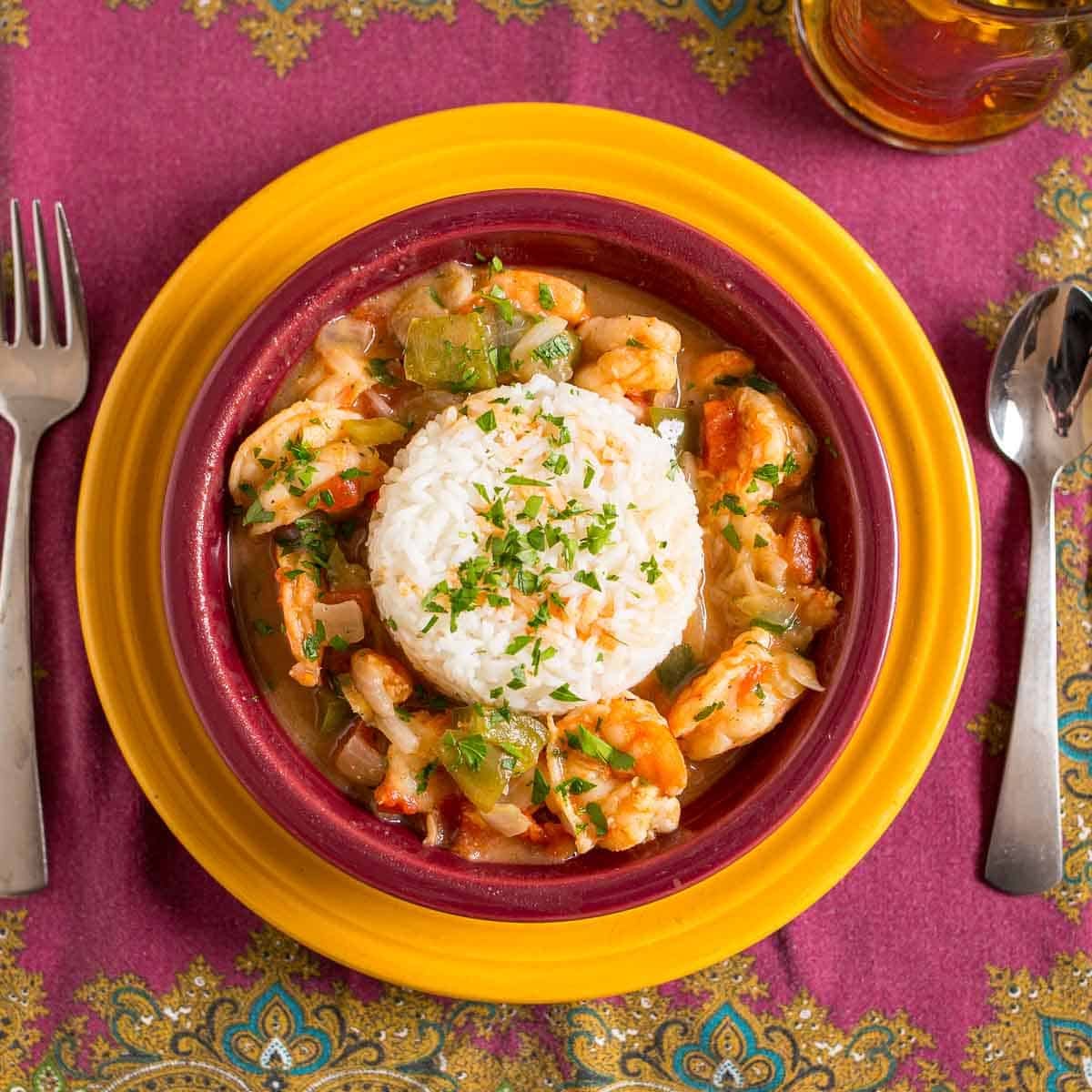 A bowl of Instant Pot Shrimp Etouffee with rice