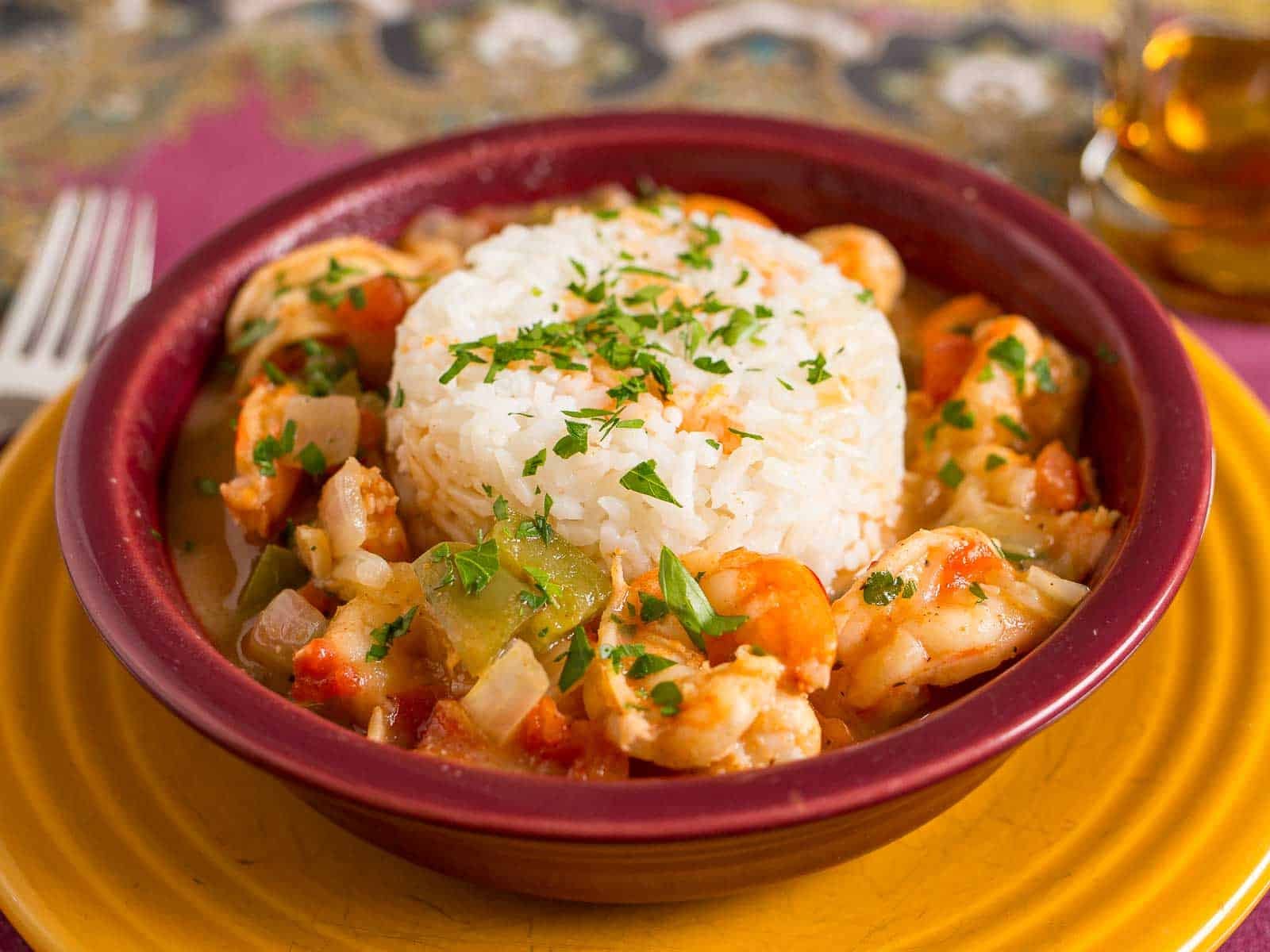 A bowl of Instant Pot Shrimp Etouffee with rice