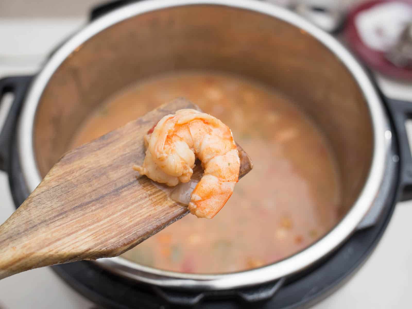 Cooked shrimp should be pink and white, not translucent