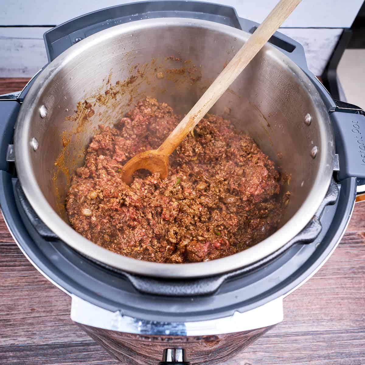 Ground beef mixed in with the chili powder and onions