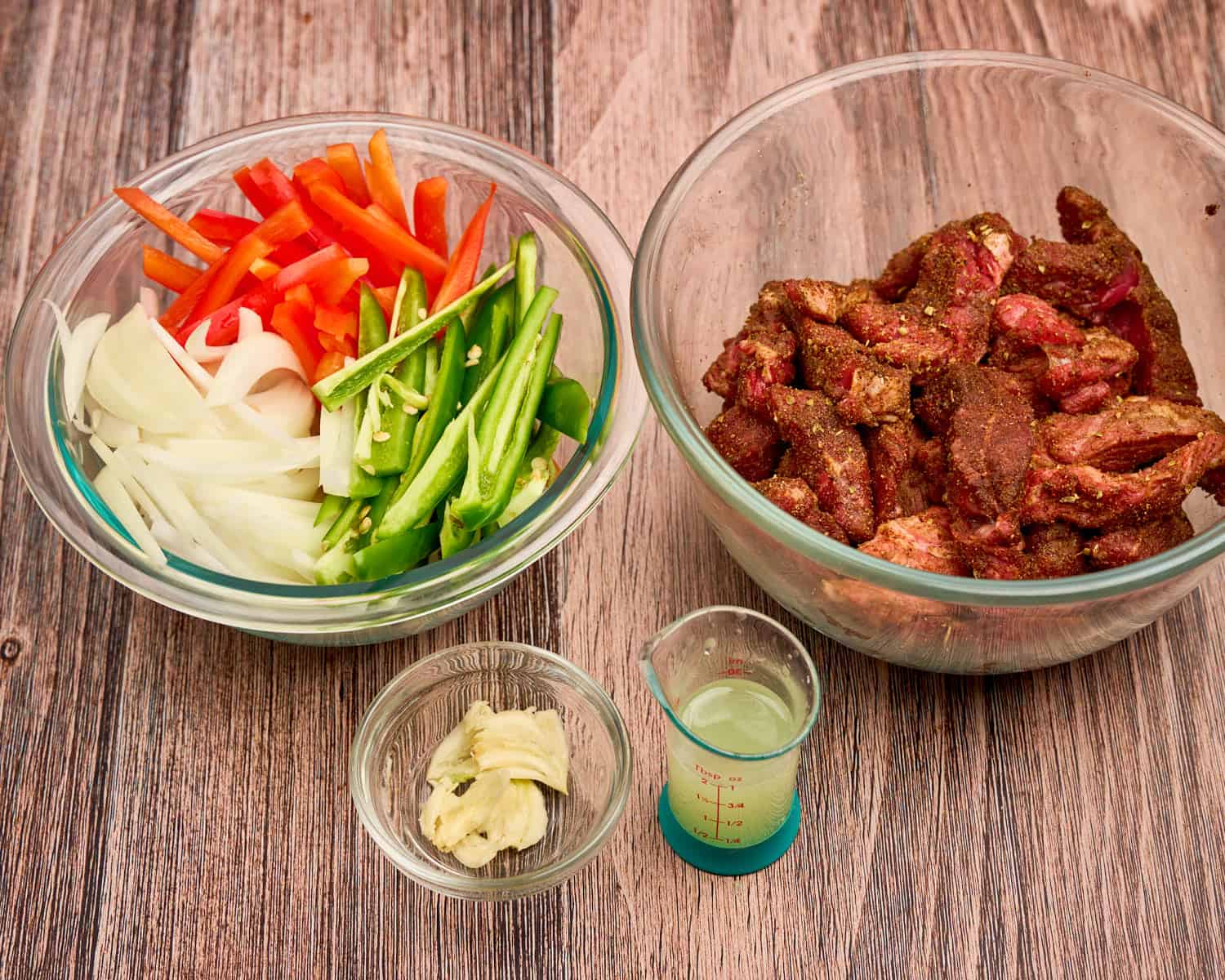 Meat and vegetables prepped and ready for cooking