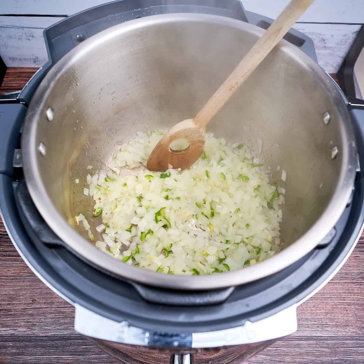 Sauteing the onions, garlic, and jalapeno