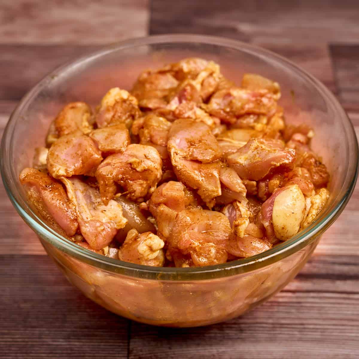 Marinating the chicken in the spices